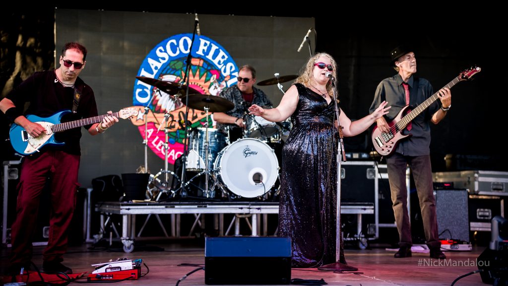 Julie Black & Her Band playing live original music on stage at the 2023 Chasco Fiesta Festival New Port Richey Florida