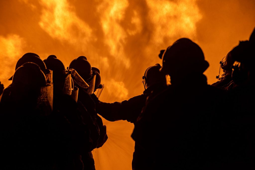 Wildland firefighters in front of fire